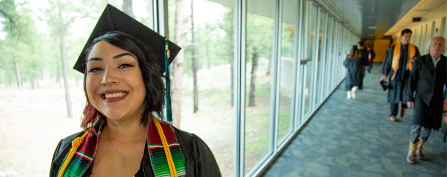 Graduate Standing in Hallway